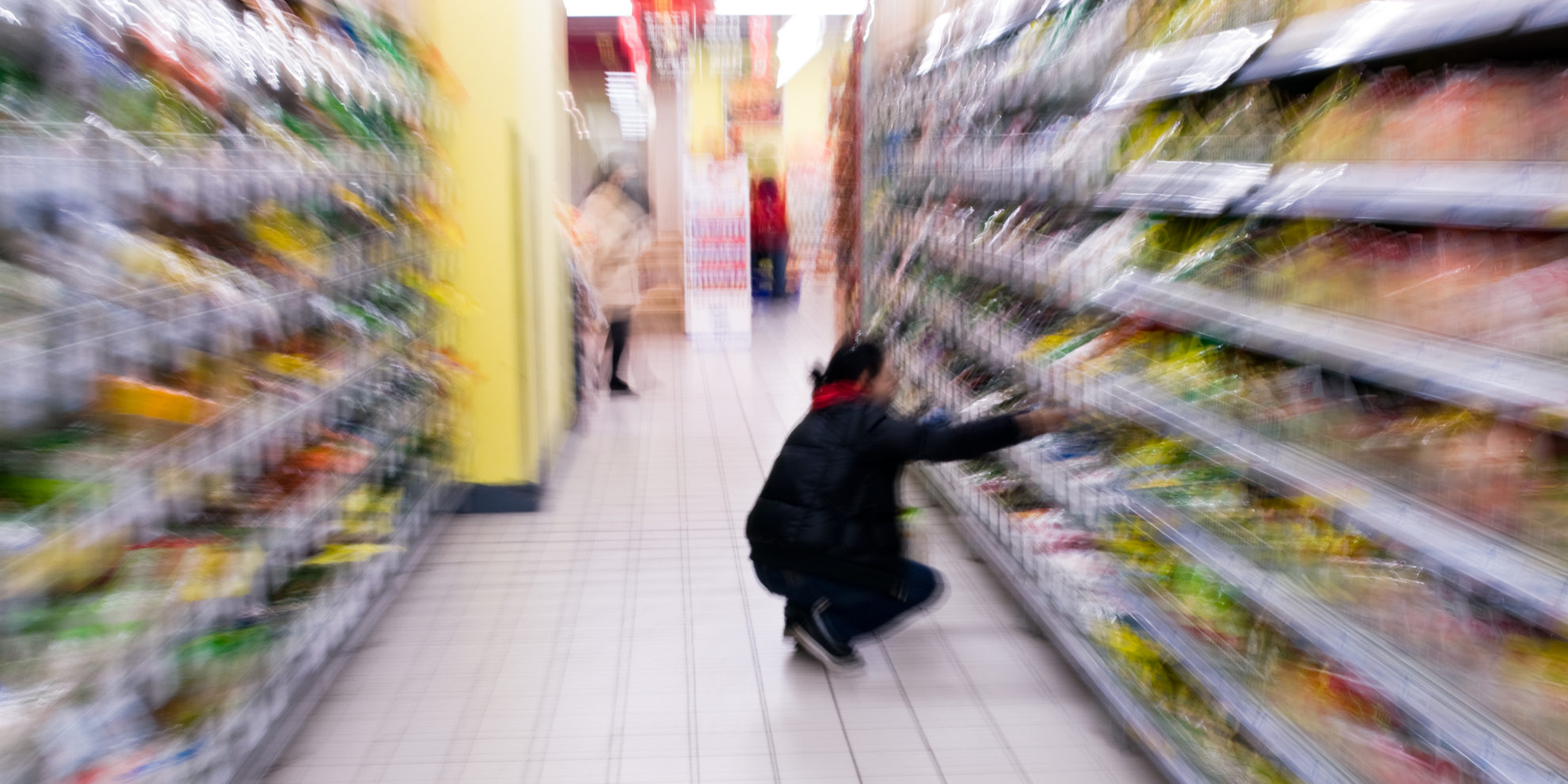 A woman shopping with zooming blur