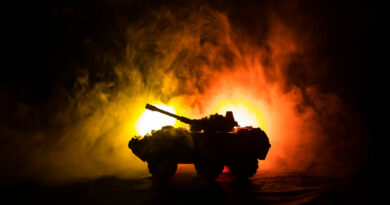 War Concept. Military silhouettes fighting scene on war fog sky background, World War German Tanks Silhouettes Below Cloudy Skyline At night. Attack scene. Armored vehicles.