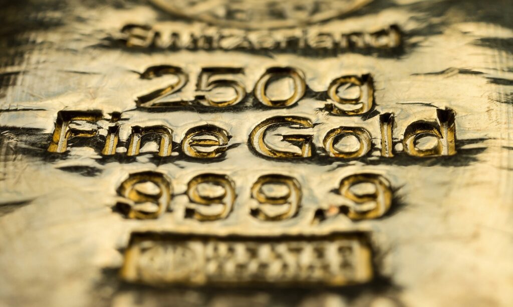 The surface of cast gold bullion. Selective focus.  (shallow DOF)