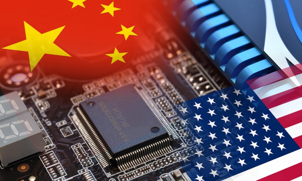 Microchip on a motherboard with Flag of China and USA. Concept for the battle of global microchips production.